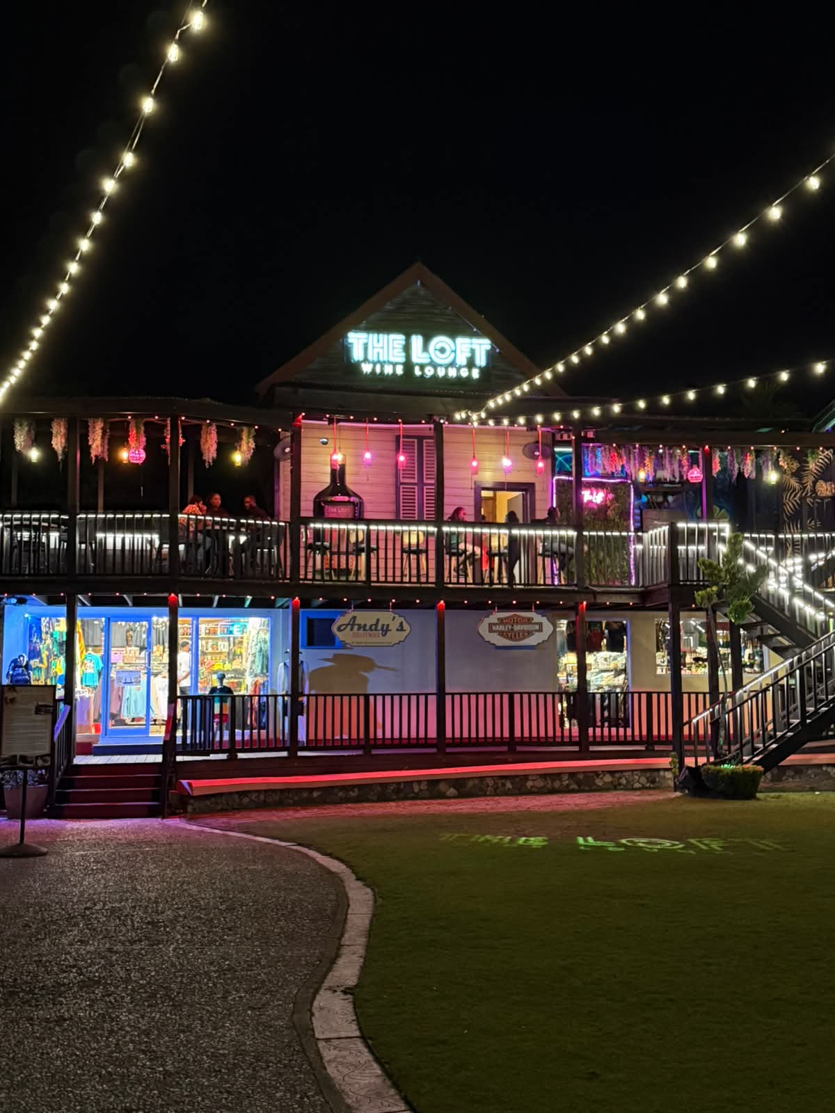 The Loft Wine Lounge exterior at night — Island Village, Ocho Rios